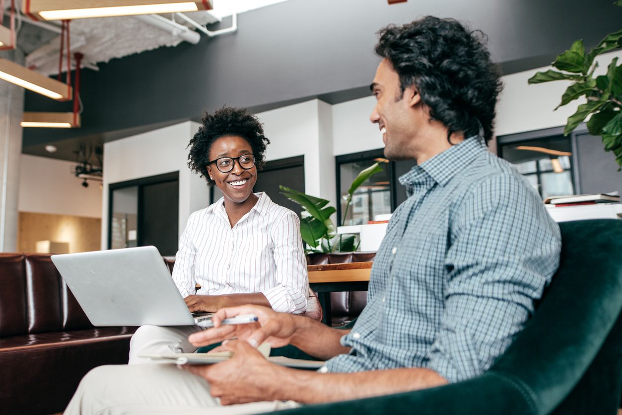 Marketing Consultant Speaking with a Small Business Owner